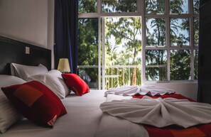 Deluxe Double Room, 1 King Bed, Beach View, Beachfront | 1 bedroom, minibar, desk, blackout curtains