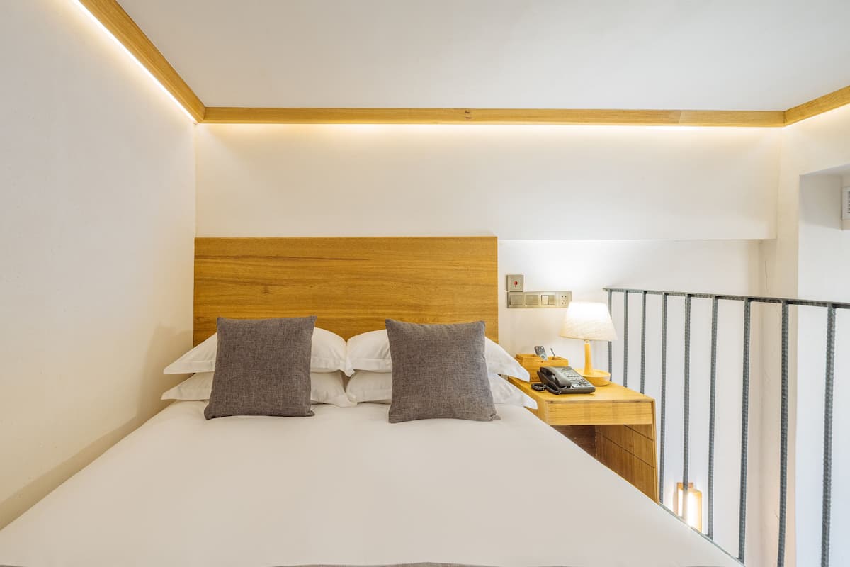 standard loft | premium bedding, blackout curtains, soundproofing, iron/ironing board