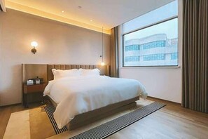 Suite, 1 King Bed, Non Smoking | Premium bedding, blackout curtains, soundproofing, iron/ironing board - Ramada Encore by Wyndham Shanghai Pudong Airport (Shanghai)