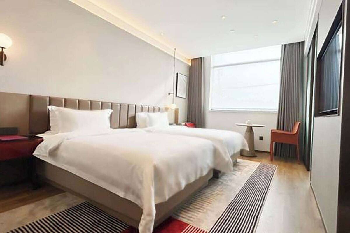 Habitación Business, 2 camas individuales, no fumadores | Ropa de cama de alta calidad, cortinas opacas, sistema de insonorización