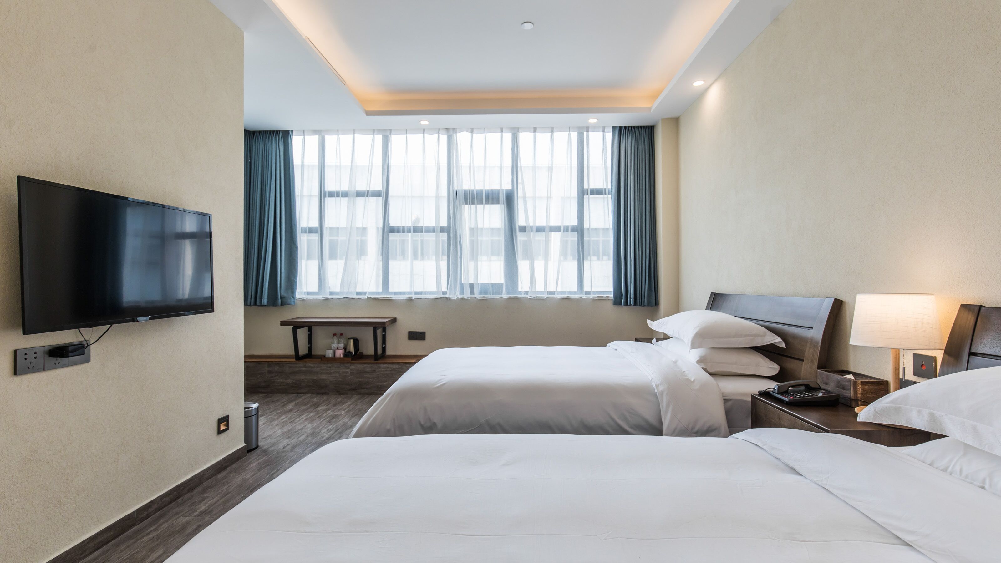 business twin room | premium bedding, blackout curtains, soundproofing, iron/ironing board