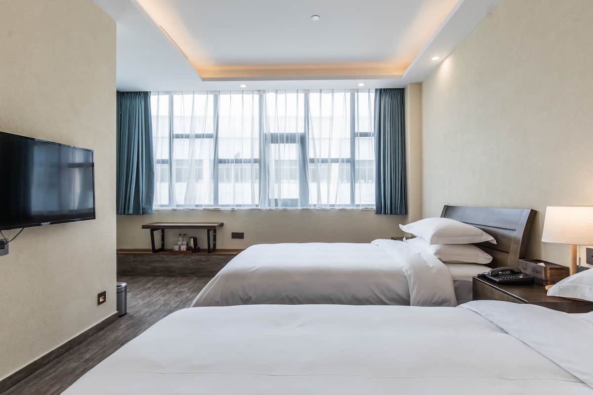 business twin room | premium bedding, blackout curtains, soundproofing, iron/ironing board