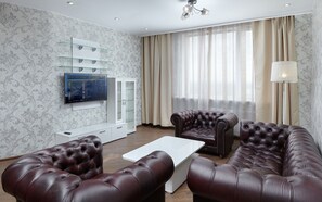 Premium-huoneisto, 1 makuuhuone | Oleskelualue | Plasmatelevisio