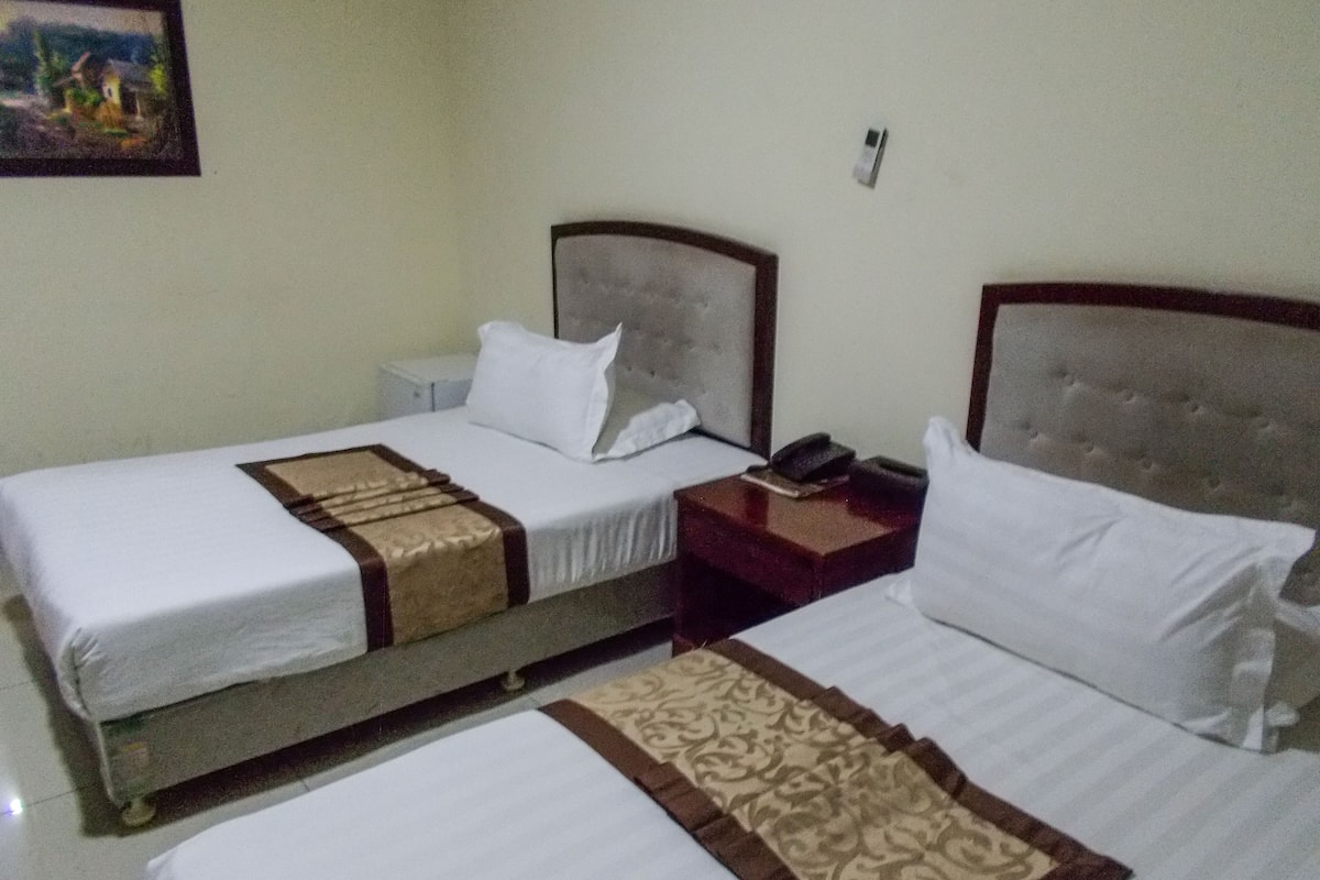 Twin Room, Garden View | In-room safe, individually decorated, individually furnished, desk