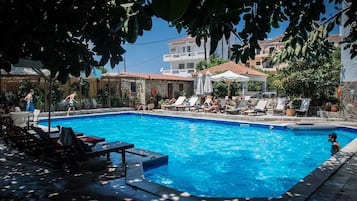 Outdoor pool, pool umbrellas, sun loungers