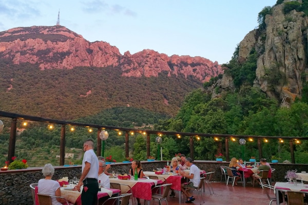 Breakfast, lunch, dinner served; local cuisine, garden views