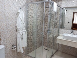 Deluxe Double Room, 1 King Bed, City View | Bathroom | Shower, rainfall showerhead, free toiletries, hair dryer