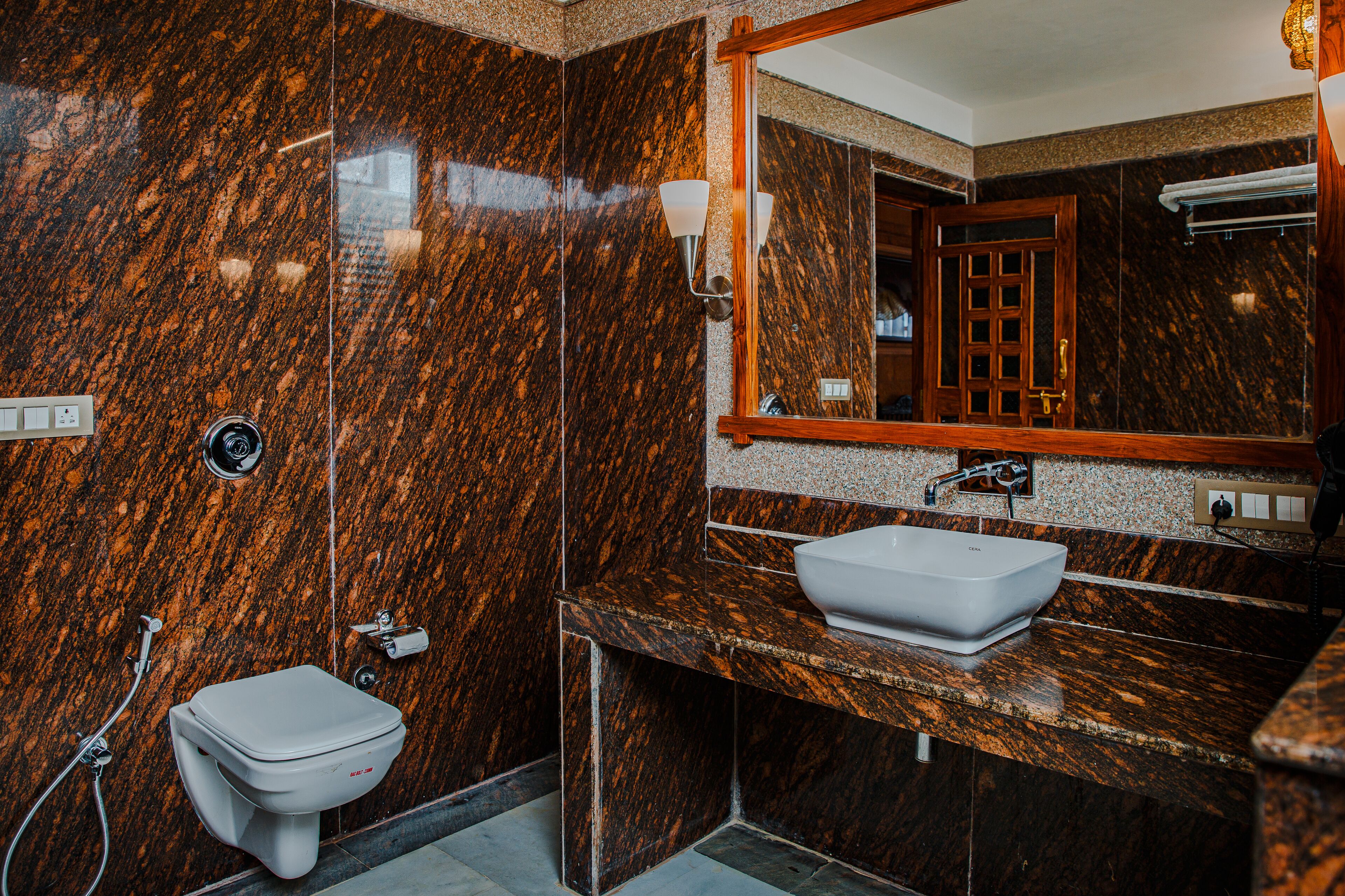 super deluxe room | bathroom | shower, free toiletries, hair dryer, towels