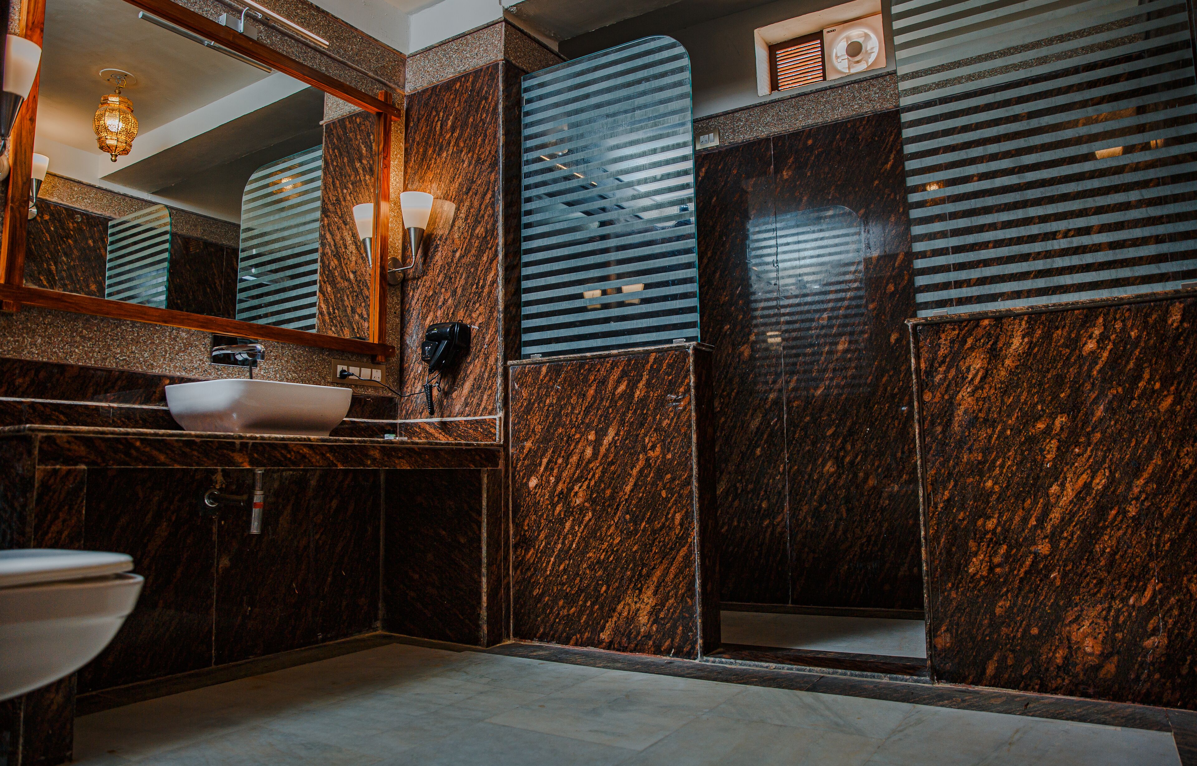 super deluxe room | bathroom | shower, free toiletries, hair dryer, towels