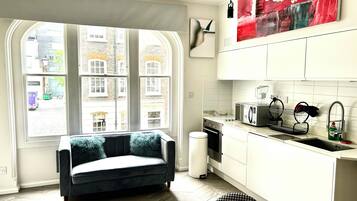 Appartement, 1 chambre | Coin séjour | Télévision à écran plat