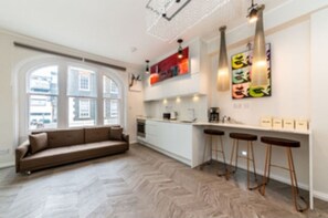 Apartment, 1 Bedroom | Living area | Flat-screen TV - Soho Suite London (London)