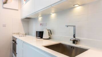 Apartment, 1 Bedroom | Private kitchen | Fridge, microwave, oven, stovetop