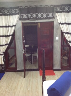 Deluxe Room, 1 Bedroom, Smoking, Garden View | 1 bedroom, in-room safe, desk, iron/ironing board - The villa sunshine (Divulapitiya)