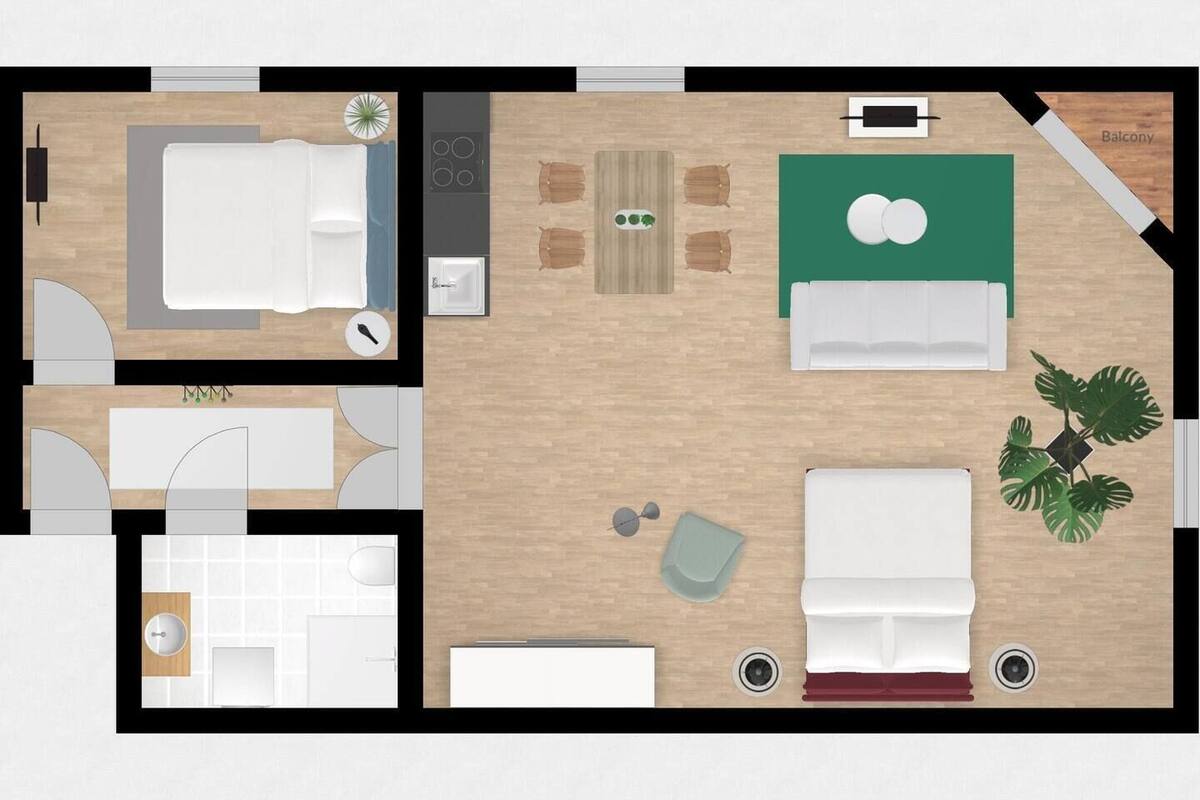 A hotel room layout with a bed, desk, chair, and a small dining area.