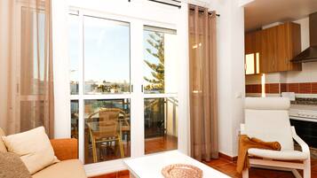 Penthouse, 2 Bedrooms, Terrace | Living area | 40-inch flat-screen TV with digital channels, TV, Netflix