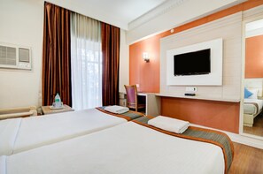 Een minibar, een kluis op de kamer, extra bedden, gratis wifi