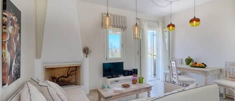 Superior Villa, 3 Bedrooms (Levante) | Living room | LCD TV, fireplace, DVD player