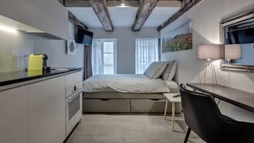 Premium bedding, laptop workspace, soundproofing, iron/ironing board