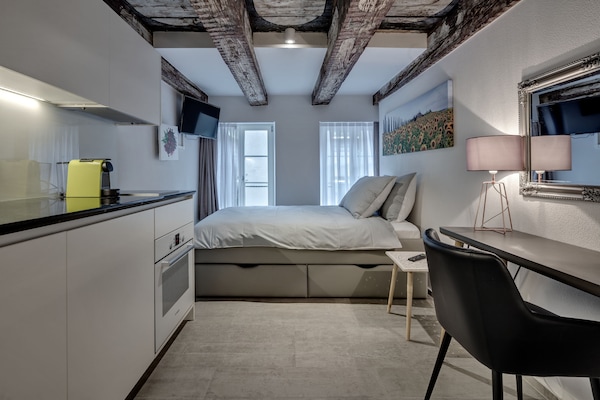 Premium bedding, laptop workspace, soundproofing, iron/ironing board