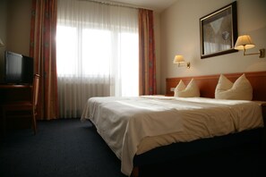 Een kluis op de kamer, een bureau, geluiddichte muren, gratis wifi