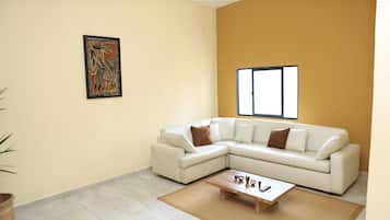 Classic Villa, 3 Bedrooms, Private Bathroom, Courtyard View | Living area | 32-inch LCD TV with cable channels, TV