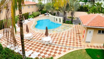 Outdoor pool, open 8 AM to 8 PM, pool loungers