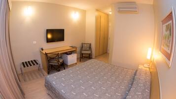 Double Room, 1 Queen Bed | Minibar, in-room safe, desk, blackout curtains