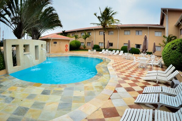 Outdoor pool, open 8 AM to 8 PM, pool loungers