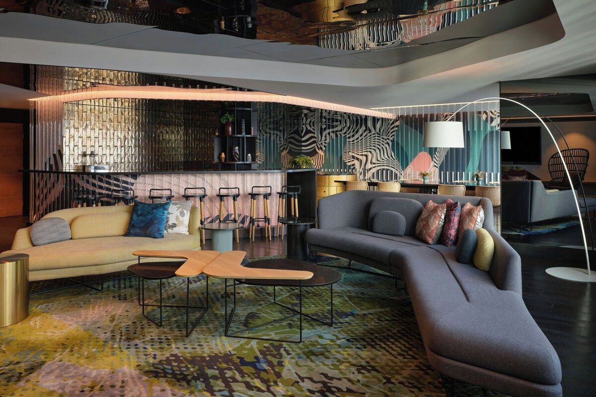 Suite, 1 Bedroom, River View | Living room | 55-inch LED TV with satellite channels, TV
