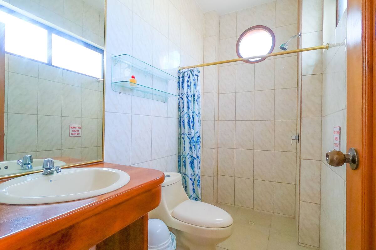 Bathroom | Shower, rainfall showerhead, eco-friendly toiletries, hair dryer