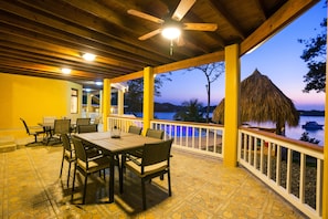 Outdoor dining - Beachfront home Outside West End w/Pool, Kayaks & Paddleboards (Sandy Bay)