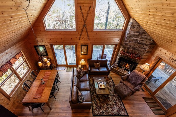 TV, fireplace, table football - Above the River | 5 Min. Walk to Water | Hot Tub & Family Game Room (West Jefferson)