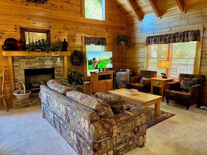 Télévision, cheminée, baby-foot