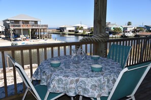 Outdoor dining - Sea Level | West end cottage with easy beach access (Dauphin Island)
