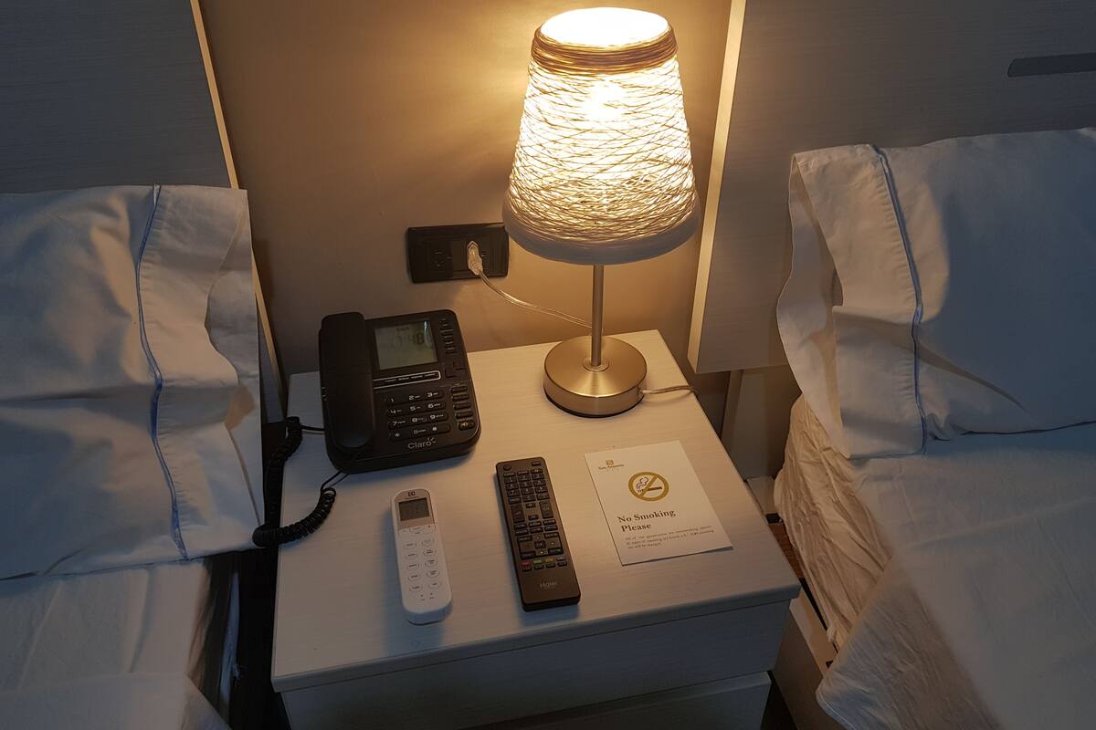 Tvåbäddsrum - 2 dubbelsängar | 1 sovrum, sängtillbehör av högsta kvalitet och minibar