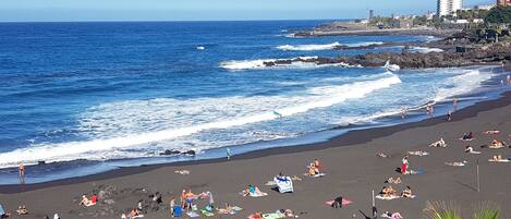 Una spiaggia nelle vicinanze, teli da spiaggia