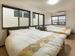 客房内保险箱、办公桌、免费 WiFi、床单
