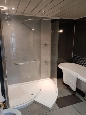 Bathtub, hair dryer, towels