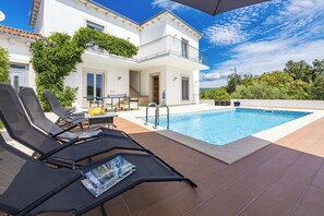 Piscine extérieure, piscine chauffée
