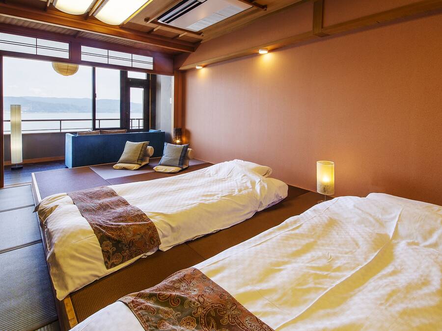 MANPA CLUB Japanese Style Room, Open Air Bath, Smoking | Down comforters, minibar, in-room safe, desk