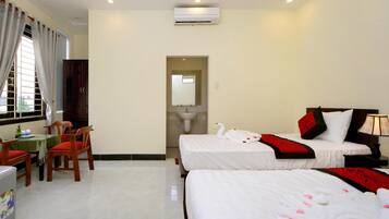 Memory-foam beds, minibar, desk, blackout curtains