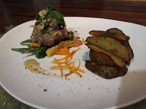 A plate with a steak, roasted potatoes, and vegetables. - The Manipura Luxury Estate & SPA 730sqm Living Area, 20m Iinfinity Pool (Ubud)