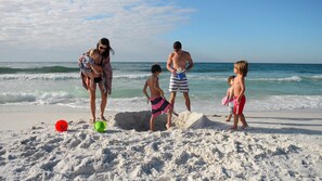 On the beach, sun-loungers, beach towels