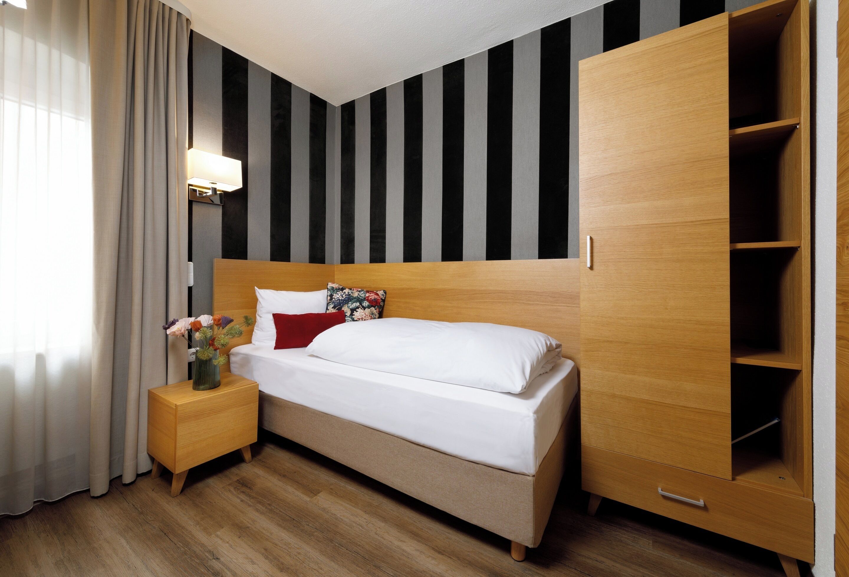 single room | premium bedding, desk, blackout curtains, soundproofing