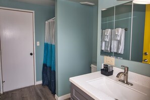 Hair dryer, towels, soap, shampoo