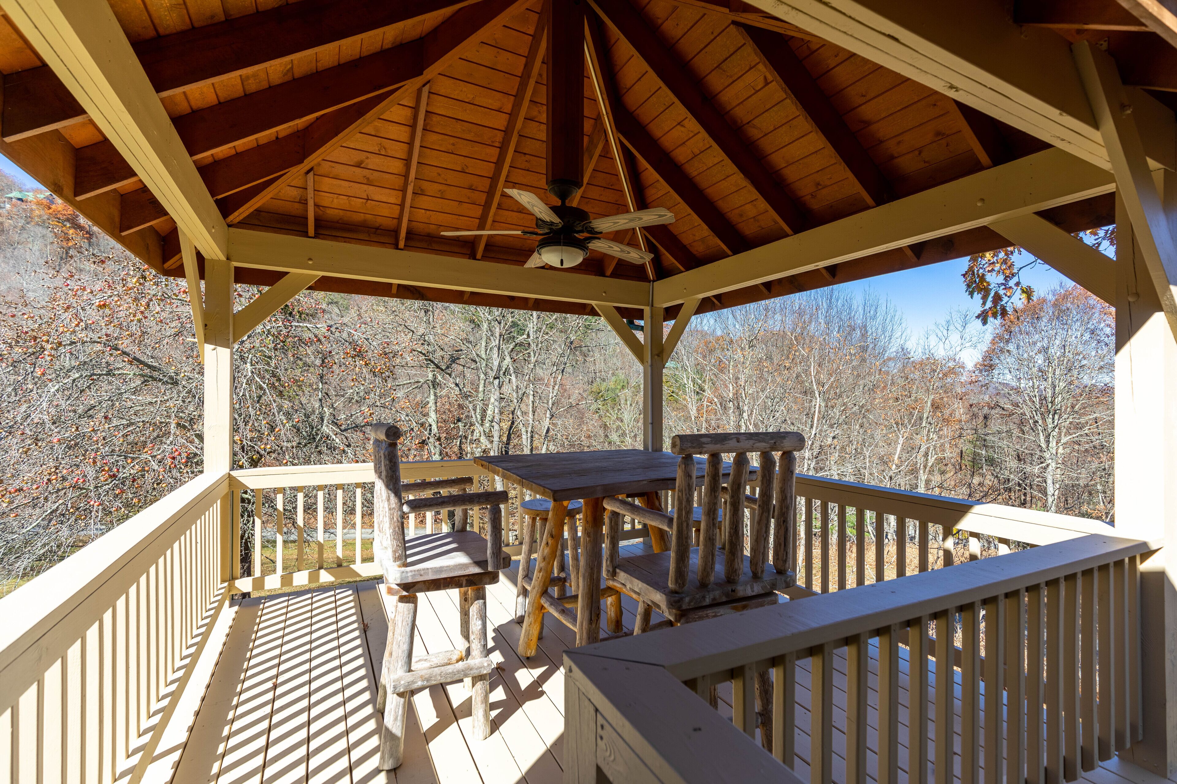Dine al fresco under the gazebo roof at A Bears Hill, surrounded by the colors of a Blue Ridge autumn.