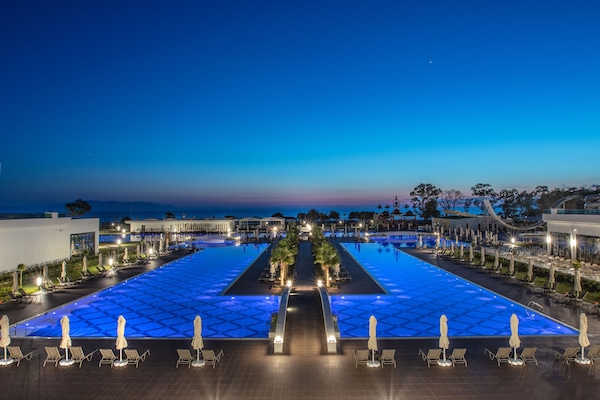 Indoor pool, outdoor pool, pool umbrellas, sun loungers