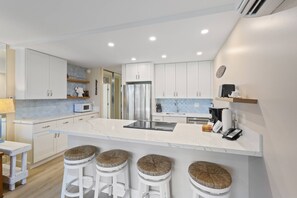 Fridge, microwave, dishwasher, coffee/tea maker