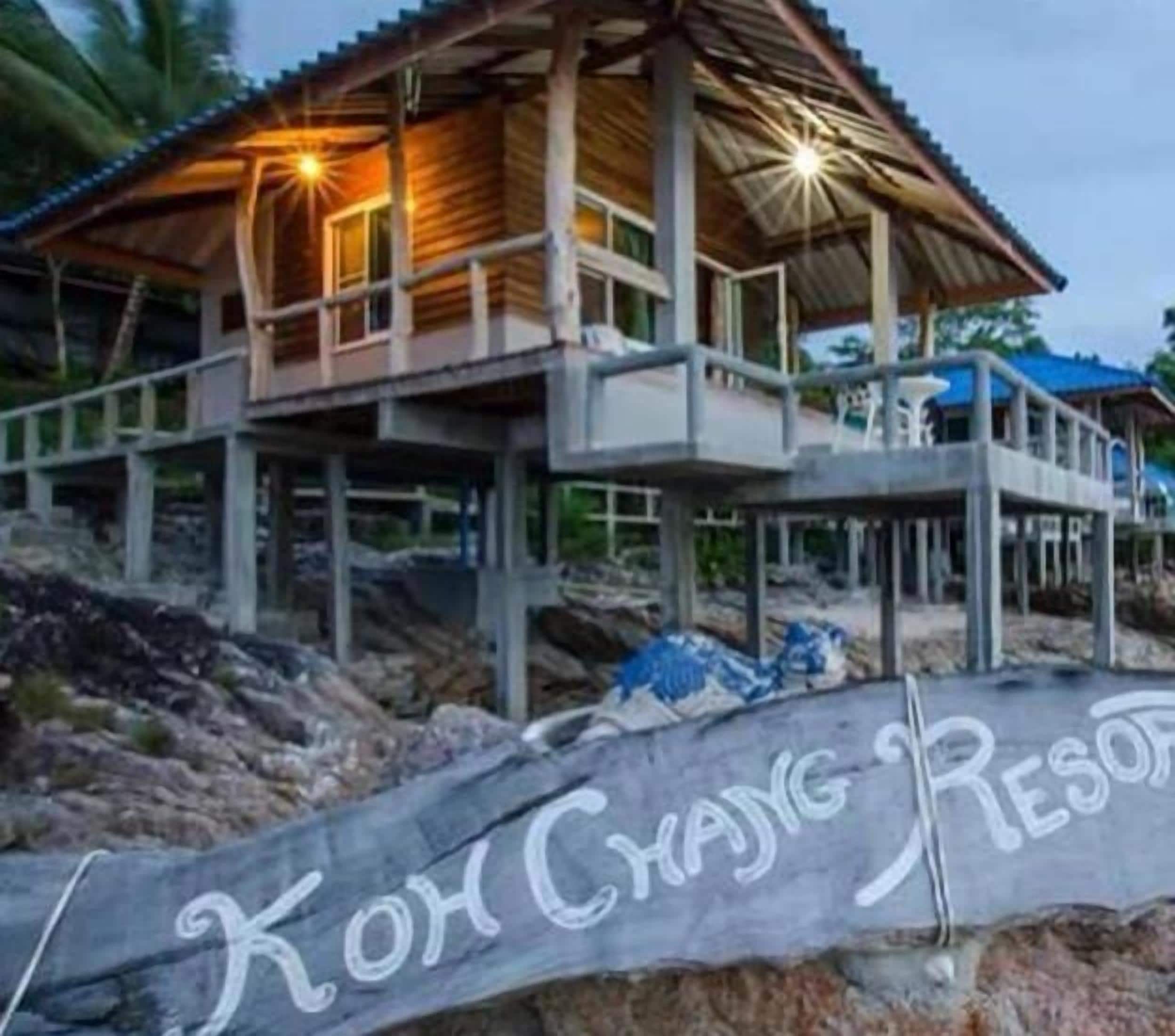 A wooden structure with a balcony, labeled "Koh Chang Resort."