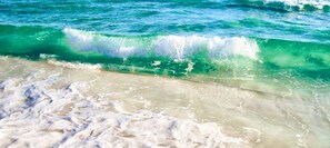 A beach with clear turquoise water and white foam waves. - (519) Paradise Found in this Stylish, high end condo. Stunning Views! (Destin)